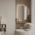 Lustro-Lomi-polokragle-podswietlane-po-obwodzie,-zawieszone-w-sypialni-nad-toaletka.-hazel design.jpg